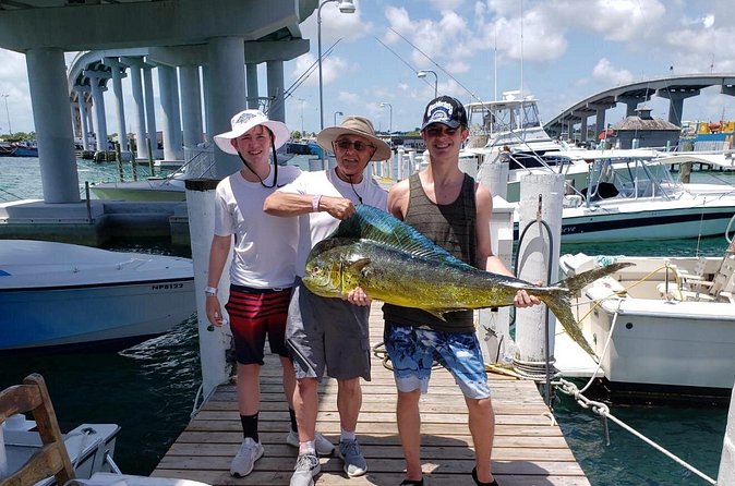 8 hours 38ft Reel Dreams Private Charter Nassau - The Nassau Yacht Haven meeting point