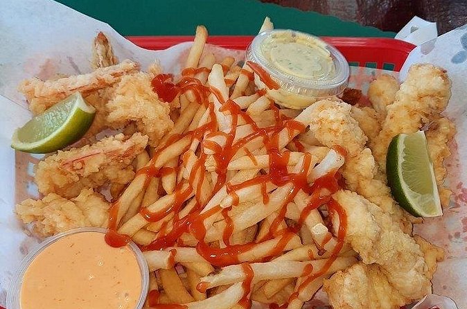 Bimini Island Food Taste Experience Tour - Stuart’s Conch Stand and a Bahamian drink