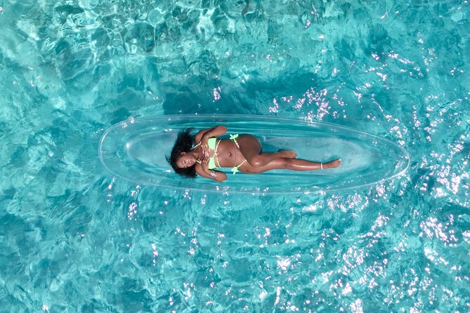Clear Kayaks Drone Photoshoot in Nassau,Bahamas. - Getting settled in the clear kayak