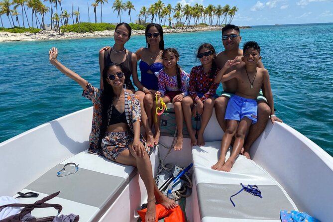 Half Day Pigs Turtles Reef and Ship Wreck Snorkeling - Beach time under a tent and chairs