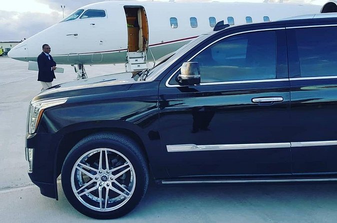 Luxury Escalade Cadillac Private Roundtrip Transportation - Comfort, Luggage, And Help At The Curb