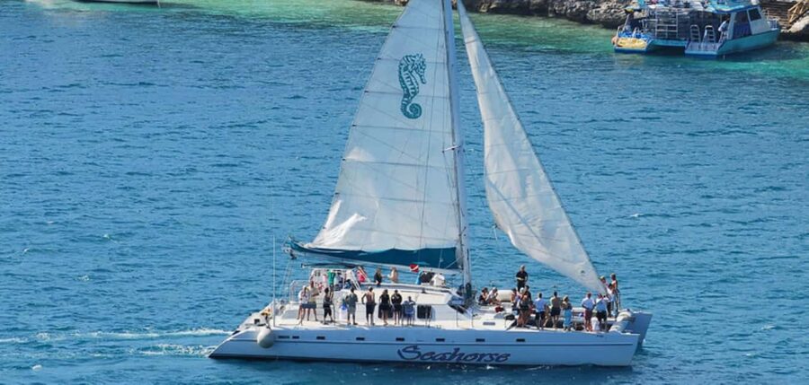 Nassau: Catamaran Sail and Snorkel Tour - Leaving Paradise Island by catamaran