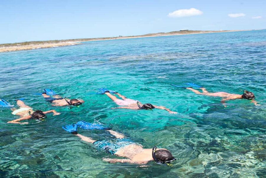 Nassau: Catamaran Sail and Snorkel Tour - Rum punch and music on the way home
