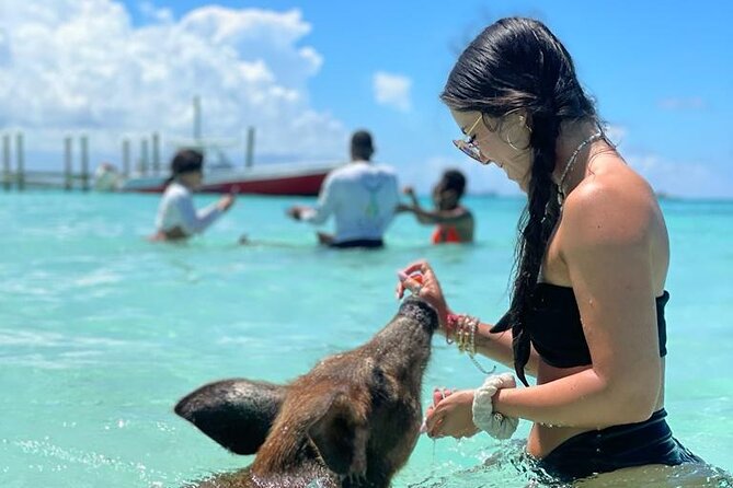 Nassau Swimming Pigs: Snorkeling, Lunch & Private Beach Club - Lunch, snacks, soda, and unlimited rum punch