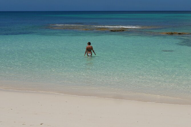 Nirvana Private Beach & Restaurant Round Trip Transportation - Four hours at a private beach