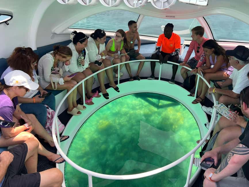 Paradise Island: Glass-Bottom Boat Tour with Live Commentary - Listening to local stories on the way