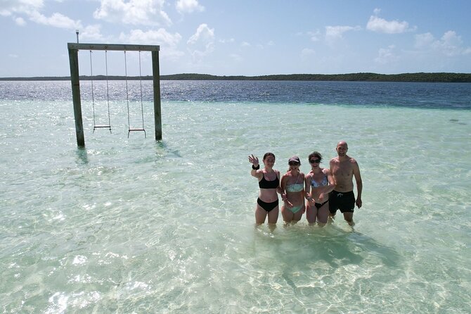 Pink Sand Beach and Swimming Pigs Adventure from Nassau - The Spanish Wells sandbar and its ocean swings